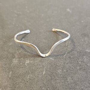 Elegant Silver Wave Bracelet